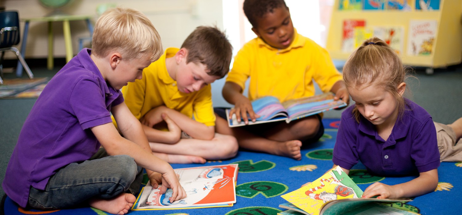 Board of Directors Elementary Kids Reading on Rug